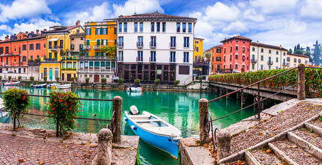 Peschiera del Garda - charming village with colorful houses in beautiful lake Lago di Garda. Verona...
