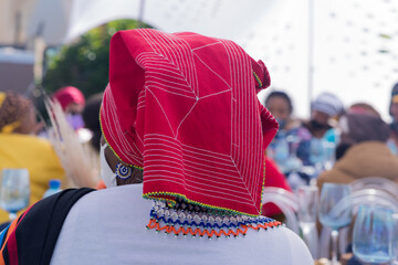 African woman with headgear shot from behind