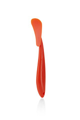 Cropped shot of a plastic orange peeler for fruits and vegetables. Vegetable cutter and slicer are isolated on the white background. Photo for catalog. 