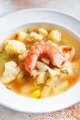 soup seafood shrimp vegetable  healthy meal diet snack on the table copy space food background rustic 