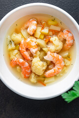 soup seafood shrimp vegetable  healthy meal diet snack on the table copy space food background rustic 