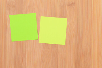 Colored Sticky Notes with Copyspace Pinned to the Wooden Message Board. To Do List Reminder in Office. Blank Memo Sticker at Work - Template. Empty Checklist - Mockup