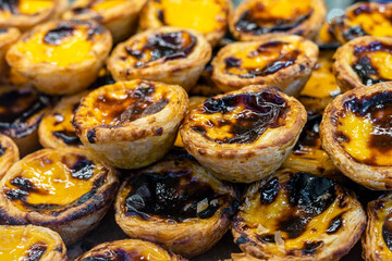 Close-up of plenty of pastel de nata - traditional sweet from Portugal