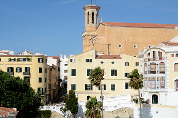 Fototapeta na wymiar The Mediterranean charm of the city and the palaces of Mahon in Menorca