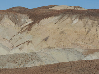 Shot of a dusty and rocky mountain that looks like a desert.