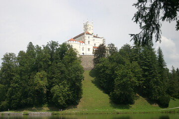 The medieval caste Trakošćan, Varaždin County, Croatia, on the top of the hill surrounded by beautiful nature in summer