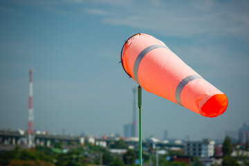 Windsock indicator of wind on tank chemical cone indicating wind direction and force. Horizontally...
