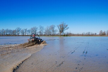 Four-wheeling in the mud and water