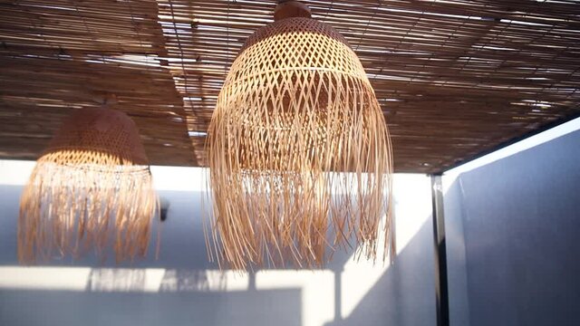 Close up shot of rustic chandelier decoration. Pan left