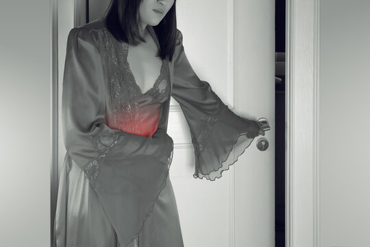 The Woman In Silk Nightwear And Red Robe Wake Up For Go To The Toilet, Women With Menstrual Disorders At Night, Menstrual Cramps, Irritable IBS Or Bowel Syndrome