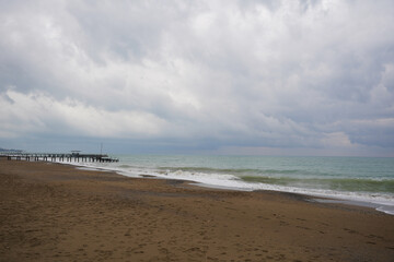 Fototapeta na wymiar Landscape on the Big Empty Sandy Beach