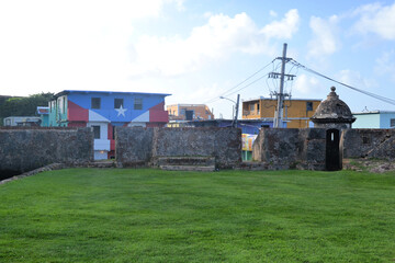 Fototapeta na wymiar Typical, colorful houses on the beach of San Juan, Puerto Rico