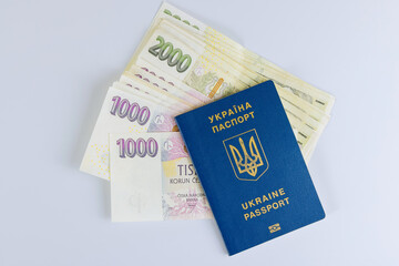 Travel Ukrainian passport of tourist to Czech republic with Czech Koruna