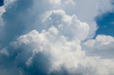 Naklejka na ściany i meble Volumetric white clouds in the afternoon