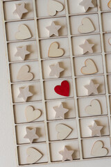 background with wooden stars and hearts on a grid