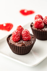 A gift of chocolate raspberry cups for Valentines Day.
