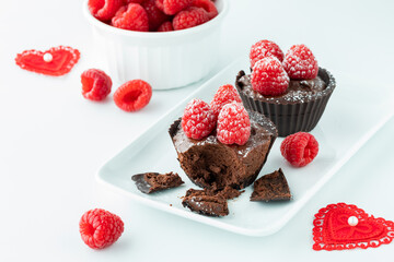 Close up of chocolate raspberry mousse filled cups for Valentines Day.