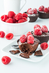Close up of chocolate raspberry mousse cups ready for eating.
