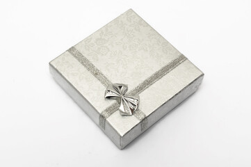 Gift paper box with a decorative print. An item designed for storing small things and small gifts.