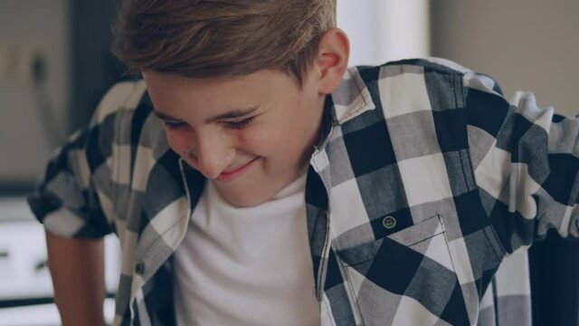Strong teen boy trying get up from wheelchair, upset with failure, willpower