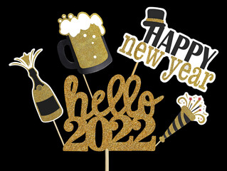 hello 2022, happy new year golden text and symbols on wooden sticks with popping champagne and frothy beer on black background, new years eve conceptual image