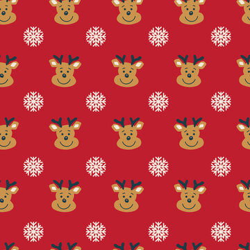Seamless vector pattern cute reindeer heads. Deer heads and snowflakes isolated on red background, vector illustration. Christmas kids design. Vector illustration for holiday fabric, gift wrap.