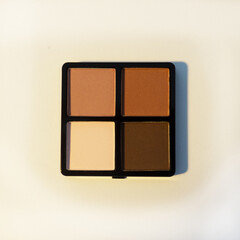Palette. Eyebrow shadow. Eyebrow cosmetic designed to fill in sparse, light, or overly tweezed or plucked eyebrows.