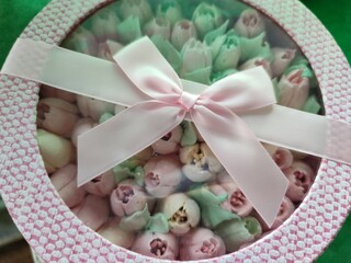 sweet tulips box. Festive dessert. Banner in a gentle floral style for congratulations, wallpaper for the screensaver	