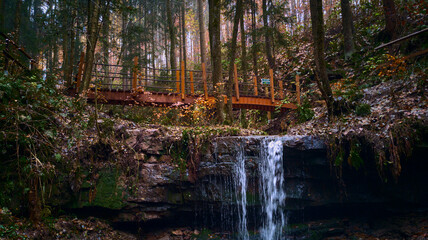 Bridge over a small waterfall