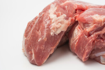 a large piece of fresh meat isolated on white. close-up