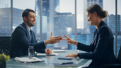 Female and Male Business Partners Have Fun and Play Rock Paper Scissors while Meeting Discussing Corporate Strategy, Financial Reports and Marketing Projects. Corporate Decisions Rely on Chance.