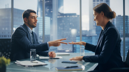 Female and Male Business Partners Have Fun and Play Rock Paper Scissors while Meeting Discussing Corporate Strategy, Financial Reports and Marketing Projects. Corporate Decisions Rely on Chance.