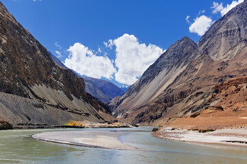 Scenic view of Confluence of Zanskar and Indus rivers - Leh, Ladakh, Jammu and Kashmir, India