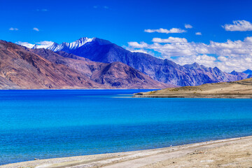 Blue water of Pangong tso (Lake). It is huge lake in Ladakh, shared by China and India along India...