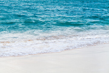 Fototapeta na wymiar Wet white sand and shore water. Dominican republic