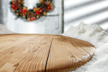 Wooden table with snow, free space, winter background