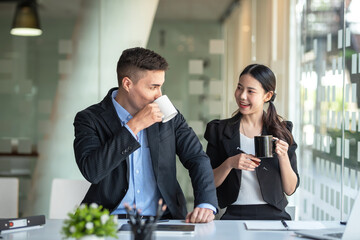 Business people drinking coffee and discuss with new startup project Idea presentation, analyze planning at office.