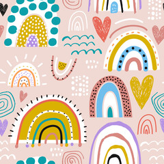 Childish seamless pattern with creative rainbows, hearts and hand drawn textures. Trendy kids vector background.