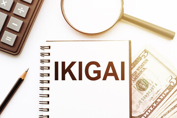 IKIGAI text on the book isolated on office desk background. Japanese concept