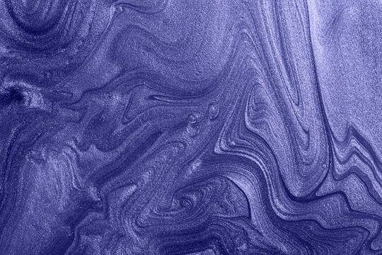 Beautiful shimmer stains of liquid nail polish,colored in trendy violet color of 2022.