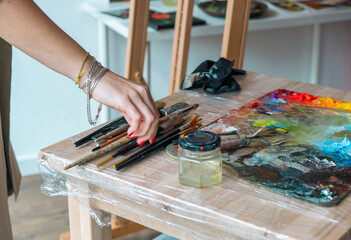 Woman artist oil painting on canvas