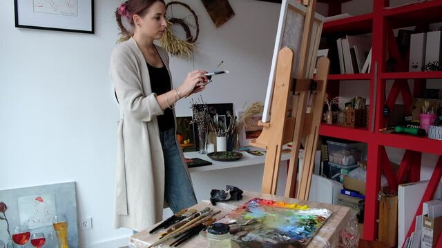 Woman artist oil painting on canvas