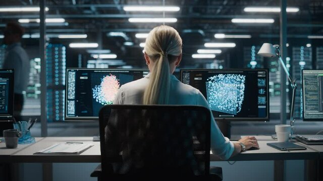Information Technology Specialist and Data Center Administrator Working on Personal Computer, Monitoring Web Services, Cloud Computing, Analytics Facility, Performing Maintenance and Cyber Security