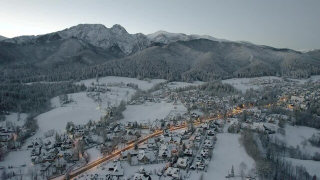 Panoramic View at Zakopane and Giewont Mount in Cold Winter Morning. Drone Aerial View at City in Snow