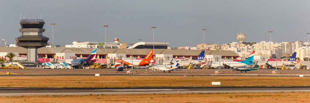 Airplanes Faro airport in Portugal panorama