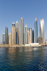 Fototapeta na wymiar Dubai Marina and Harbour skyline architecture wealth luxury travel in United Arab Emirates portrait format