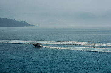 Naklejka premium sea trip on a motor boat along the Adriatic coast near Budva, Montenegro, Europe