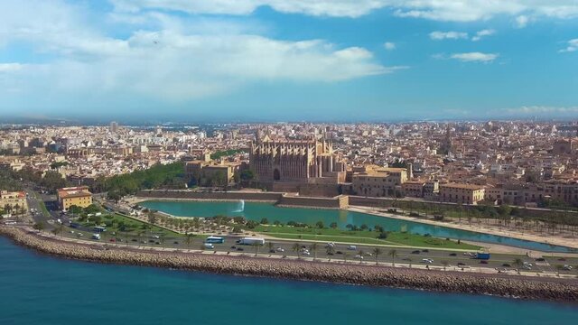 Palma de Mallorca cityscape. Cathedral La Seu of Santa Maria Royal Palace of La Almudaina, old architecture drone top point of view, sunny day. Travel, landmark, famous place. Balearic Islands. Spain