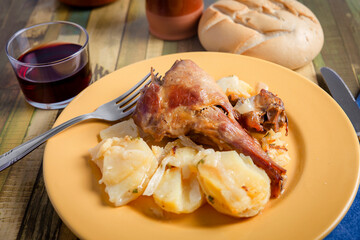 dish with oven roasted lamb with potatoes. traditional Christmas food