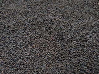 Black tea powder, black background